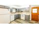 Functional kitchen featuring a dishwasher, an oven, and neutral cabinetry at 2757 Shelley Ln, Ellenwood, GA 30294