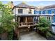 Backyard with a covered porch, patio, and lush landscaping for outdoor enjoyment and relaxation at 5160 Pratt Sw St, Covington, GA 30014