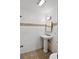 Small shower room with tiled walls, decorative accent tiles and mosaic tile floor at 5160 Pratt Sw St, Covington, GA 30014