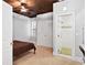 Bedroom with wood ceiling and ensuite bathroom with tiled shower at 5160 Pratt Sw St, Covington, GA 30014