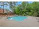 Sparkling community pool with ample lounge chairs and tables, perfect for relaxing and enjoying sunny days at 5435 Vicarage Walk, Alpharetta, GA 30005