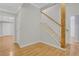 Inviting foyer with hardwood floors and staircase at 5435 Vicarage Walk, Alpharetta, GA 30005