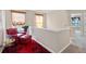 Bright loft area featuring a chair, and window views at 988 Treymont Way, Lawrenceville, GA 30045