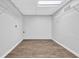 This storage room is perfect for a walk-in closet with vinyl floors and white wire shelving at 6307 Thornhedge Dr, Riverdale, GA 30296