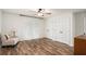 Bright, airy bedroom with lots of closet space, wood floors, and natural light at 801 Sugar Creek Se Trl, Conyers, GA 30094