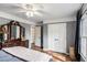 Bedroom with an accent wall, closet, natural light, and wood-look floors at 801 Sugar Creek Se Trl, Conyers, GA 30094