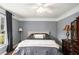 Cozy bedroom with a neutral color palette and bright natural light at 801 Sugar Creek Se Trl, Conyers, GA 30094