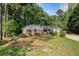 Charming brick home with a well-maintained lawn, mature landscaping, and a classic design at 801 Sugar Creek Se Trl, Conyers, GA 30094
