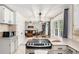 Bright kitchen with stainless steel appliances and a view of the living room at 801 Sugar Creek Se Trl, Conyers, GA 30094