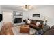 Inviting living room featuring a fireplace, hardwood floors, and comfortable seating at 801 Sugar Creek Se Trl, Conyers, GA 30094
