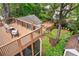 Aerial view of deck overlooking backyard with playground and garden at 1028 Amsterdam Ne Ave, Atlanta, GA 30306