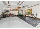 Spacious garage featuring workout area with equipment and storage for multiple bikes and accessories at 1028 Amsterdam Ne Ave, Atlanta, GA 30306