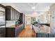 Modern kitchen with stainless steel appliances, granite countertops, and hardwood floors at 1028 Amsterdam Ne Ave, Atlanta, GA 30306