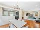 Spacious living area showcasing an open layout that seamlessly connects to the dining area and kitchen at 1028 Amsterdam Ne Ave, Atlanta, GA 30306