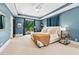 Bright main bedroom with sitting area, and access to private balcony at 1028 Amsterdam Ne Ave, Atlanta, GA 30306