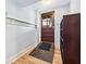 Inviting mudroom featuring coat hooks, a bench, and a door to the outside, providing convenience and organization at 1028 Amsterdam Ne Ave, Atlanta, GA 30306