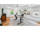 Bright home office with hardwood floors, natural light, and custom shelving, creating a productive and comfortable workspace at 1028 Amsterdam Ne Ave, Atlanta, GA 30306