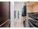 Well-organized walk-in closet with custom shelving and hanging rods, providing ample storage space for clothing and accessories at 1028 Amsterdam Ne Ave, Atlanta, GA 30306