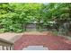 Large backyard landscaped with mulch, offering a peaceful outdoor retreat and space for recreation at 301 Fortune Ne St, Atlanta, GA 30312