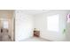 Bright bedroom with a window and hardwood floors at 5344 Flat Rock Pt, Stonecrest, GA 30038