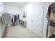 Walk-in closet with shelving and storage space at 5344 Flat Rock Pt, Stonecrest, GA 30038