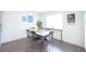Bright dining room with natural light, seating for six and hardwood floors at 5344 Flat Rock Pt, Stonecrest, GA 30038