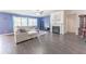 Inviting living room with a fireplace, hardwood floors, and comfortable seating at 5344 Flat Rock Pt, Stonecrest, GA 30038