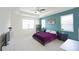 The bright and open main bedroom features ample space and natural light at 5344 Flat Rock Pt, Stonecrest, GA 30038