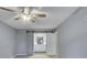 Spacious bedroom with ceiling fan and barn door to bathroom for a modern touch at 1615 Arden Sw Dr, Marietta, GA 30008