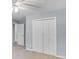 Bedroom featuring double closet and ceiling fan at 1615 Arden Sw Dr, Marietta, GA 30008