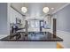 Bright kitchen featuring granite countertops, stainless appliances, and pendant lighting at 1615 Arden Sw Dr, Marietta, GA 30008