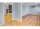 Spacious area featuring hardwood floors, a fireplace, and view to adjacent room with fireplace at 1615 Arden Sw Dr, Marietta, GA 30008