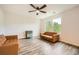 Bright living room featuring contemporary flooring, and ample seating by the window at 33 Oxford Ln, Kingston, GA 30145