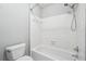Bright bathroom featuring clean white tiles and modern fixtures at 3335 New Heritage Dr, Alpharetta, GA 30022