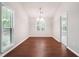 The dining room features hardwood floors and neutral walls at 3335 New Heritage Dr, Alpharetta, GA 30022