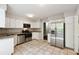 Well-lit kitchen featuring granite countertops and stainless steel appliances at 3335 New Heritage Dr, Alpharetta, GA 30022