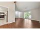 The living room features hardwood floors and adjoins the kitchen at 3335 New Heritage Dr, Alpharetta, GA 30022