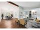 Bright living room with vaulted ceilings and ample seating, flowing into dining area at 3335 New Heritage Dr, Alpharetta, GA 30022