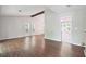 This large living room has hardwood floors and an open design at 3335 New Heritage Dr, Alpharetta, GA 30022