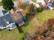 Aerial view of a home, showcasing its roof, patio, and surrounding green backyard space at 3775 Reston Ln, Decatur, GA 30034