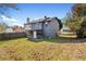 Exterior shot of backyard featuring a screened in porch with yard and privacy fence at 3775 Reston Ln, Decatur, GA 30034