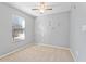 Bedroom with neutral carpet, ceiling fan, and light gray walls at 3775 Reston Ln, Decatur, GA 30034