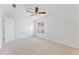 Bright, spacious bedroom featuring neutral carpet and a ceiling fan at 3775 Reston Ln, Decatur, GA 30034