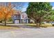 Inviting exterior featuring a well-maintained lawn, attached garage, and charming curb appeal at 3775 Reston Ln, Decatur, GA 30034