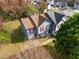 Aerial front view of home featuring red shutters and a driveway at 3775 Reston Ln, Decatur, GA 30034