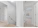Hallway with carpet and white doors leading to bedrooms at 3775 Reston Ln, Decatur, GA 30034
