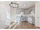 Well-lit kitchen featuring gray cabinets, modern appliances, and a pristine window providing natural light at 3775 Reston Ln, Decatur, GA 30034