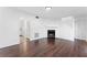 Cozy living room showcasing a fireplace, hardwood floors, and ample natural light at 3775 Reston Ln, Decatur, GA 30034