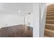 Spacious living room with hardwood floors and a view of the carpeted stairs at 3775 Reston Ln, Decatur, GA 30034