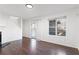 Bright living room boasts hardwood floors, large windows, and a sliding door at 3775 Reston Ln, Decatur, GA 30034